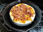 Hot smoked Brie with apricot preserves and chopped bacon